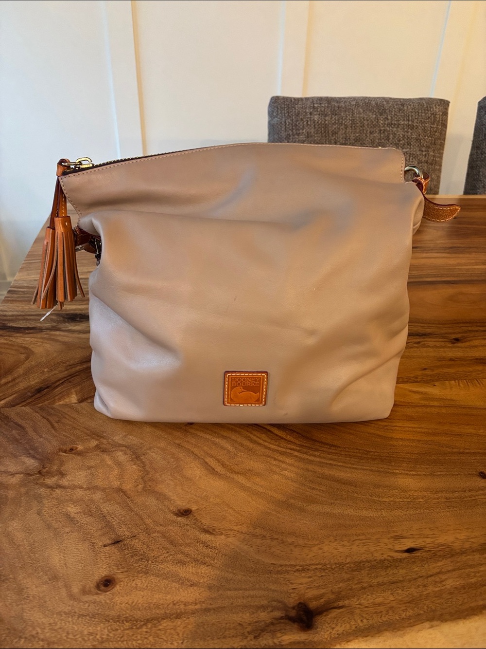 Dooney & Bourke Beige Leather Shoulder Bag with Tassel